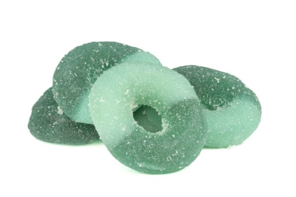 Green sugar-coated gummy rings candy.